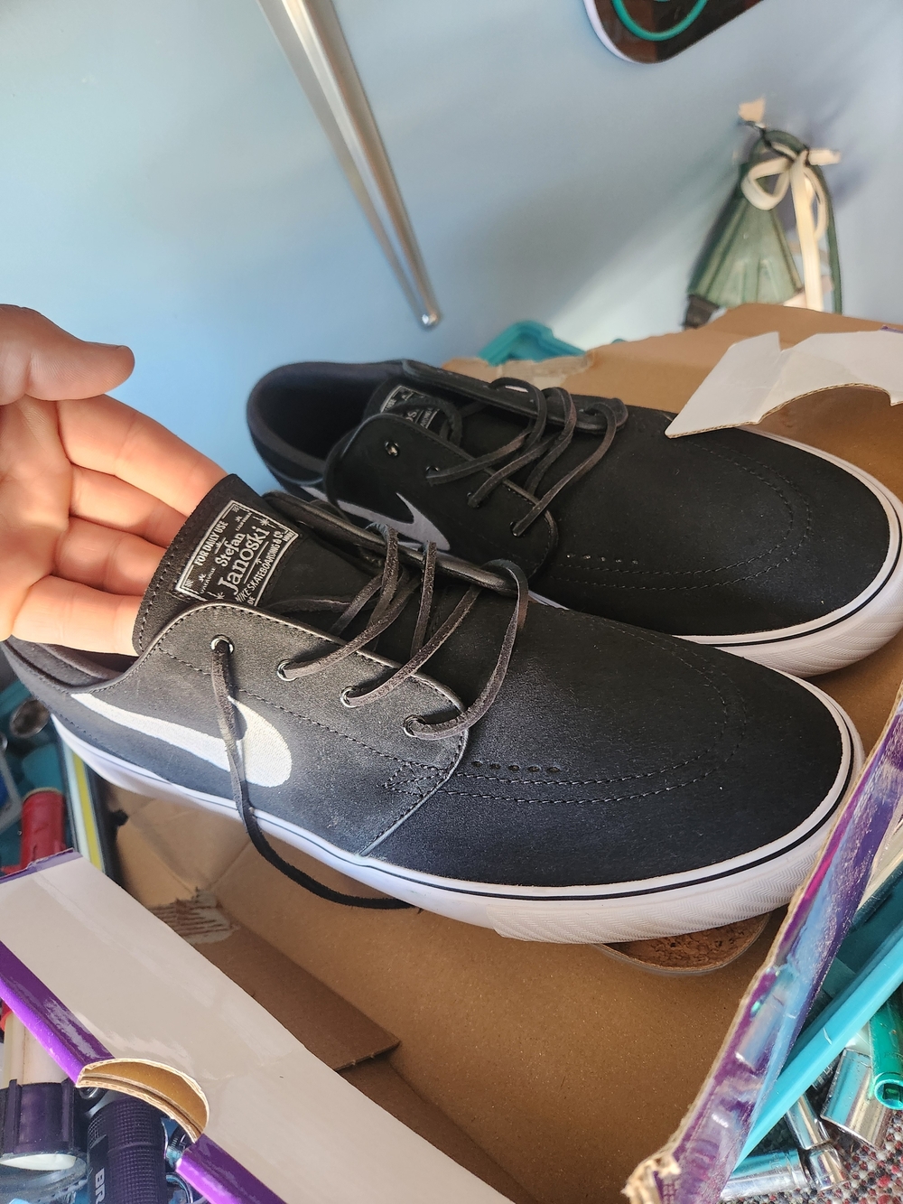 Nike Men’s Black Sneakers with White Swoosh